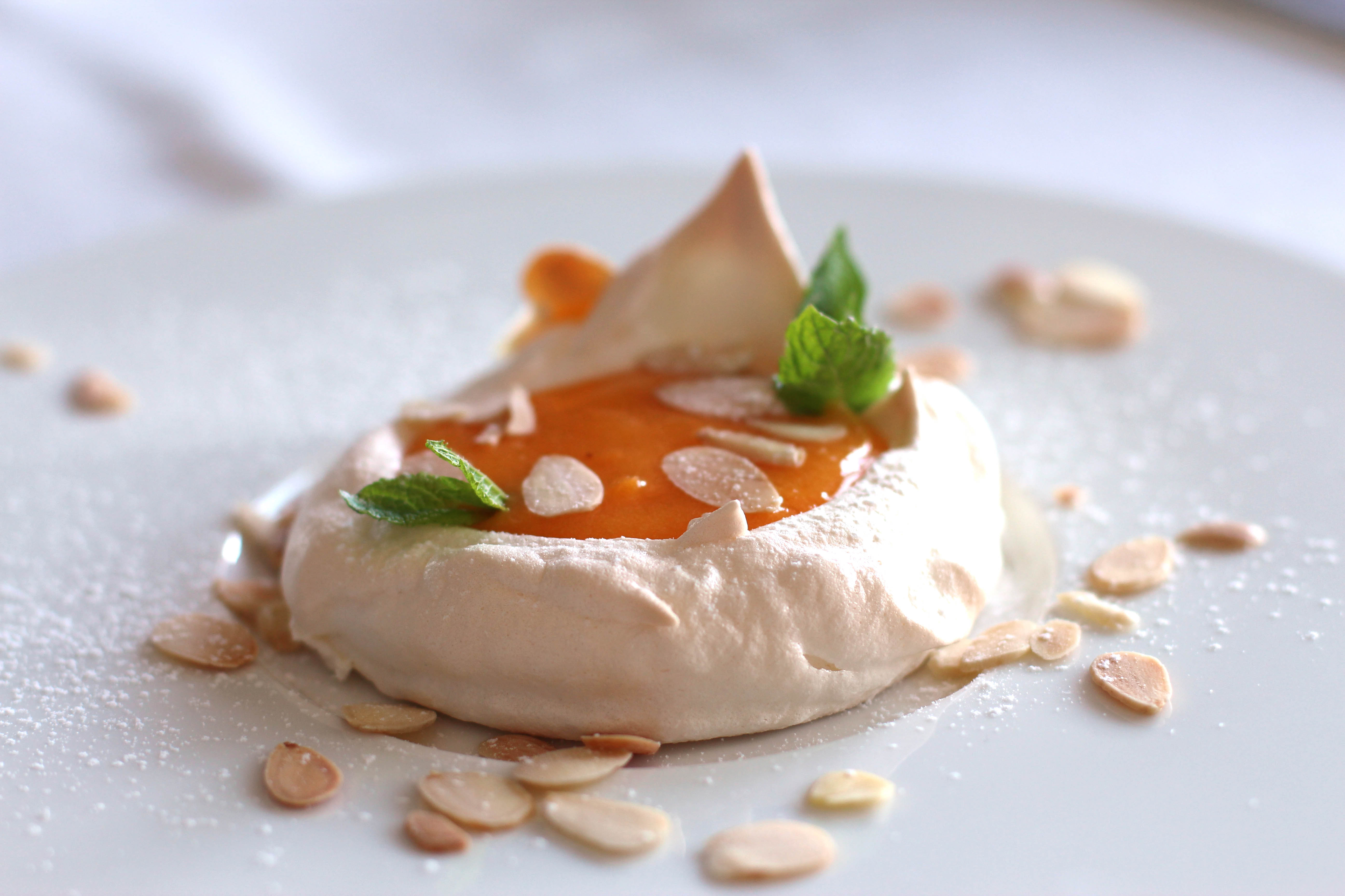 Pavlova with Classic Egg Cream and Roasted Almonds 
